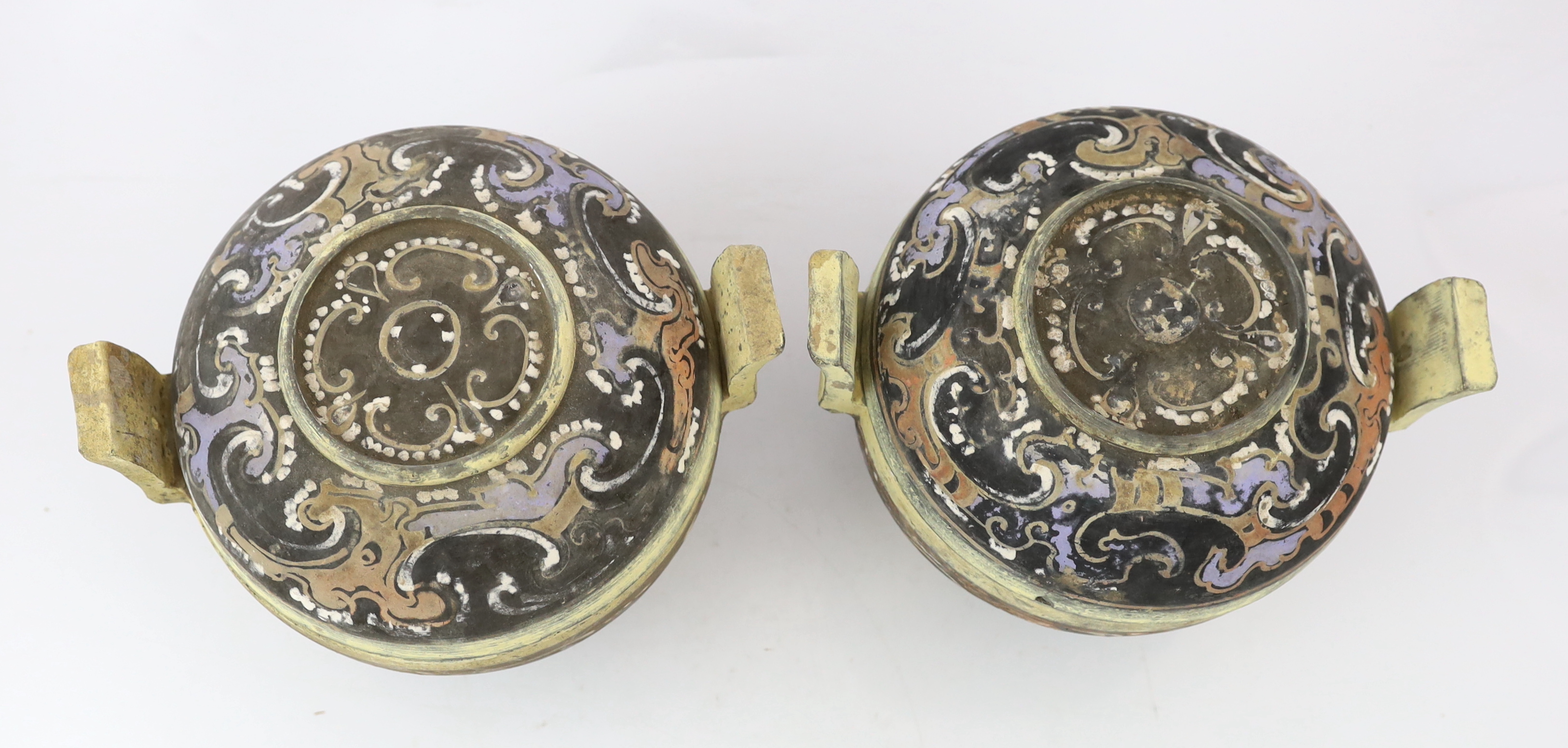 A pair of Chinese polychrome pottery ritual tripod vessels and covers, ding, Han dynasty (202BC - 220AD)